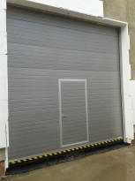 Sekční průmyslová vrata, š. 2500mm x v. 4250mm, vzor lamela, barva šedá, povrch stucco