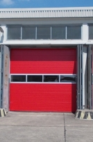 Sekční průmyslová vrata, š. 2750mm x v. 4500mm, vzor lamela, barva červená, povrch stucco