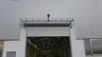 Sekční průmyslová vrata, š. 4500mm x v. 2500mm, vzor lamela, barva stříbrná, povrch stucco 
